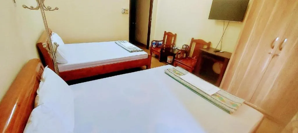 Bed in Linh Dan Hotel