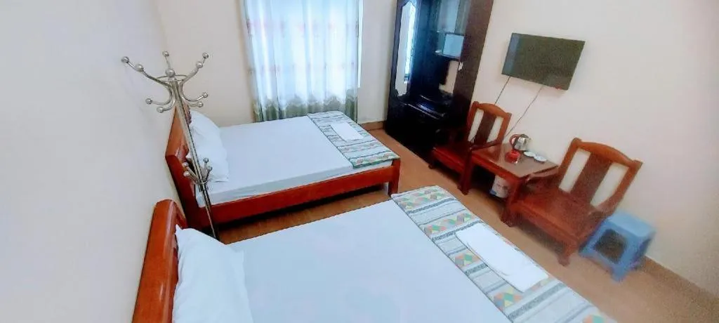 Bed in Linh Dan Hotel