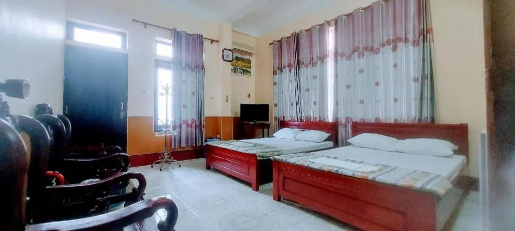 Bed in Linh Dan Hotel