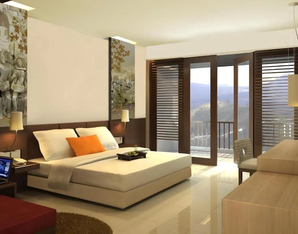 Bed in The Oxalis Regency Hotel