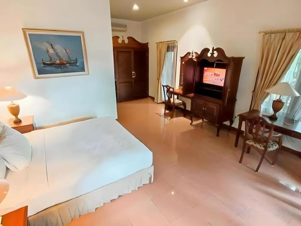 Bed in The Oxalis Regency Hotel