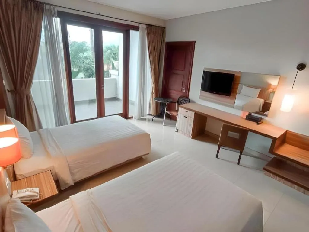 Bed in The Oxalis Regency Hotel