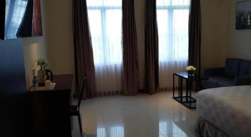 Bed in Sunbreeze Hotel