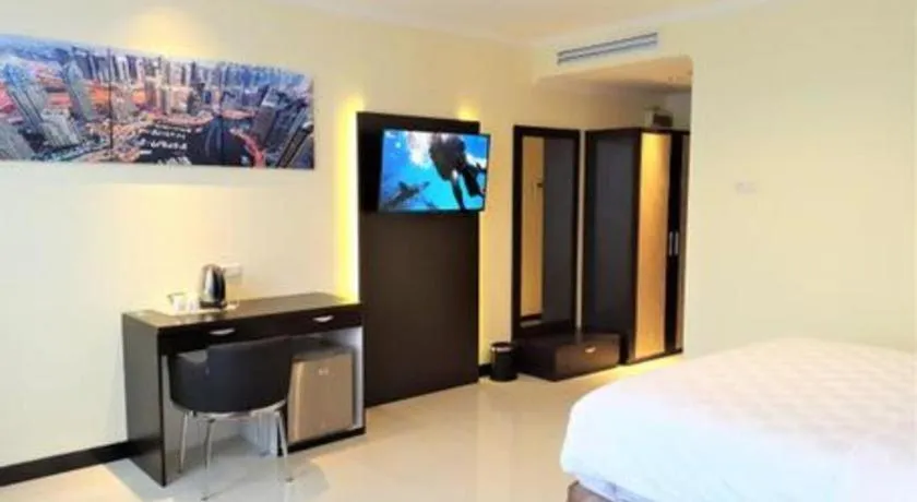 Bed in Sunbreeze Hotel