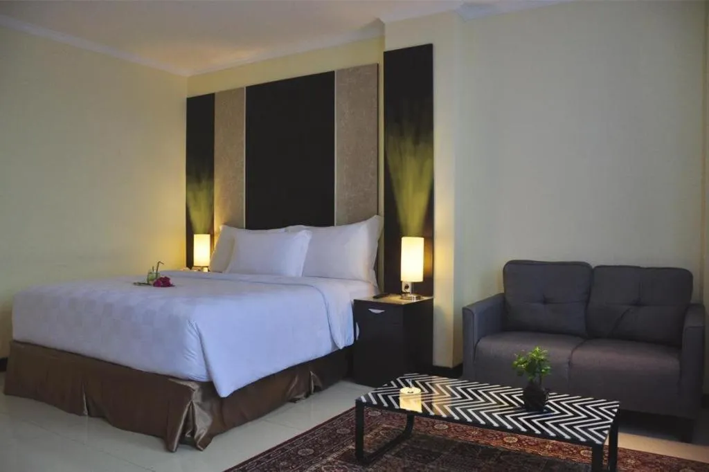 Bed in Sunbreeze Hotel