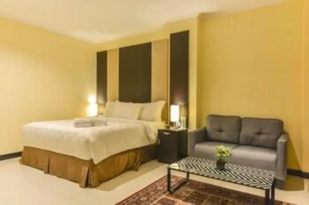 Bed in Sunbreeze Hotel