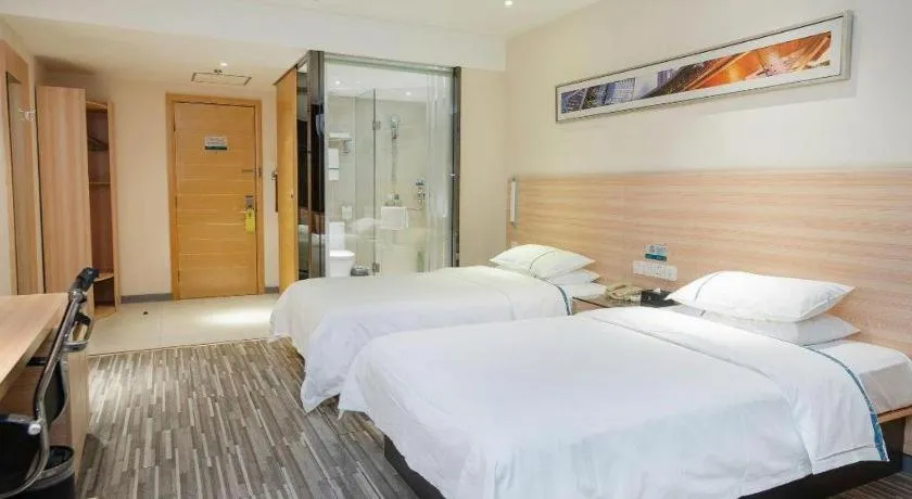 Bed in City Comfort Inn Yichang Gezhouba CBD Shopping Center