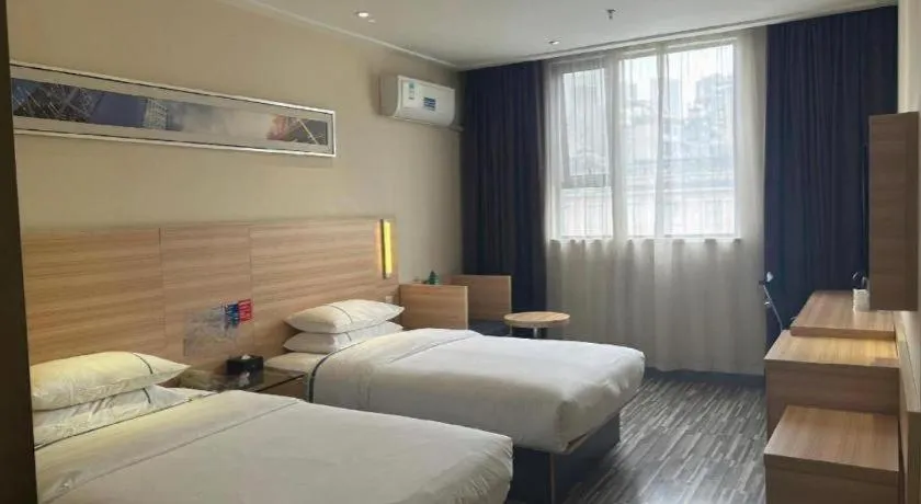 Bed in City Comfort Inn Yichang Gezhouba CBD Shopping Center