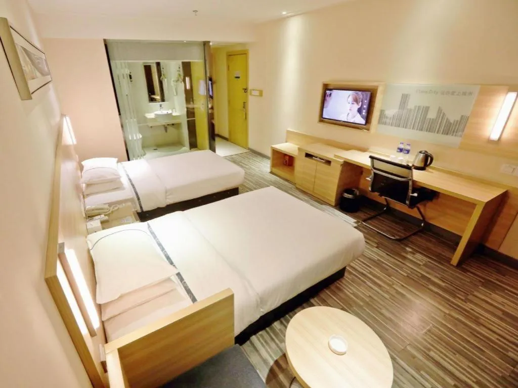Bed in City Comfort Inn Yichang Gezhouba CBD Shopping Center