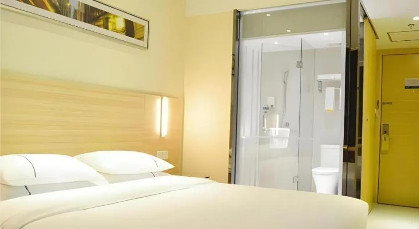 Bed in City Comfort Inn Yichang Gezhouba CBD Shopping Center