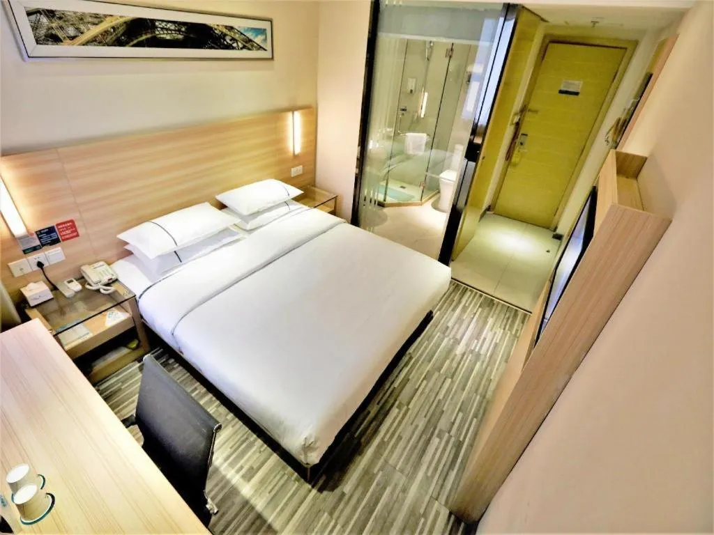 Bed in City Comfort Inn Yichang Gezhouba CBD Shopping Center
