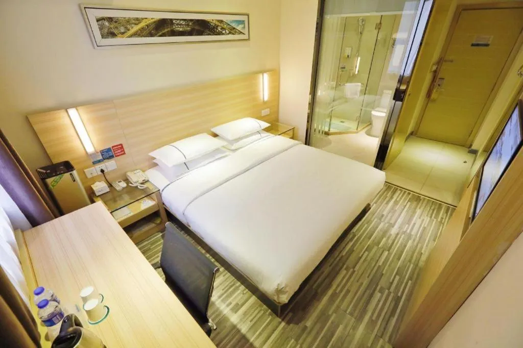 Bed in City Comfort Inn Yichang Gezhouba CBD Shopping Center