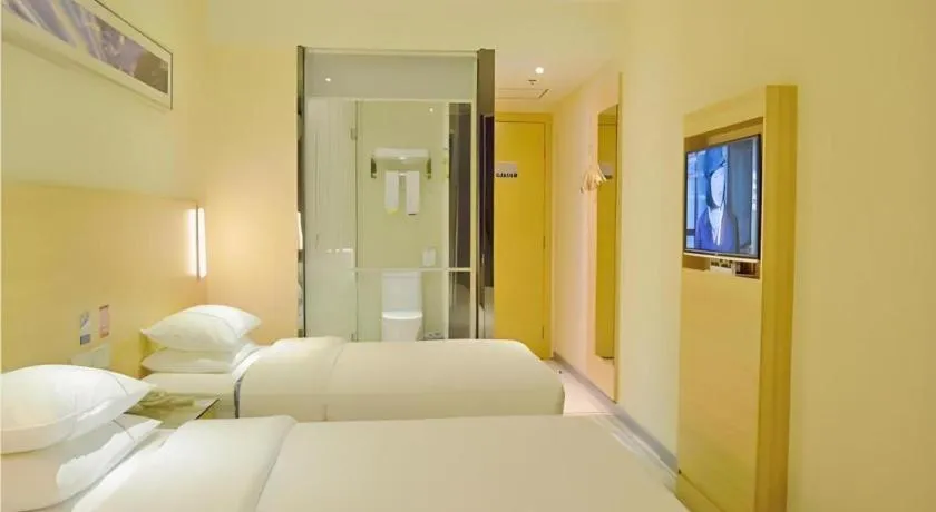 Bed in City Comfort Inn Yichang Gezhouba CBD Shopping Center