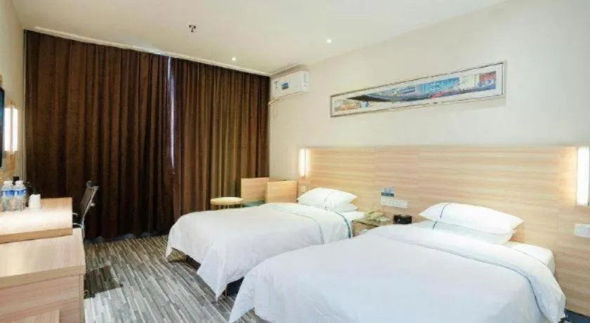 Bed in City Comfort Inn Yichang Gezhouba CBD Shopping Center