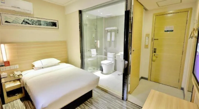 Bed in City Comfort Inn Yichang Gezhouba CBD Shopping Center