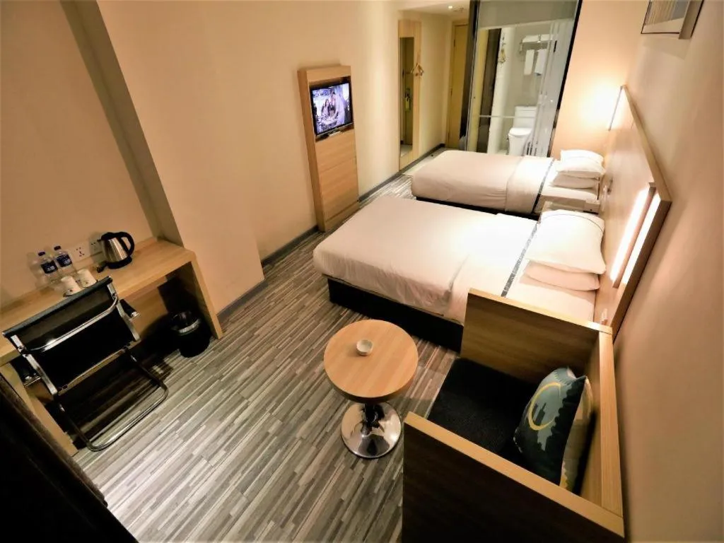 Bed in City Comfort Inn Yichang Gezhouba CBD Shopping Center