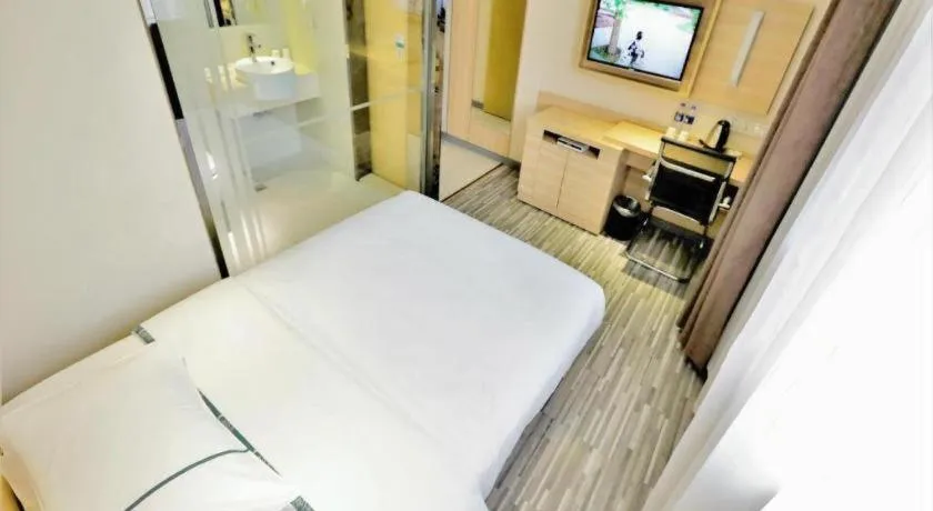 Bed in City Comfort Inn Yichang Gezhouba CBD Shopping Center