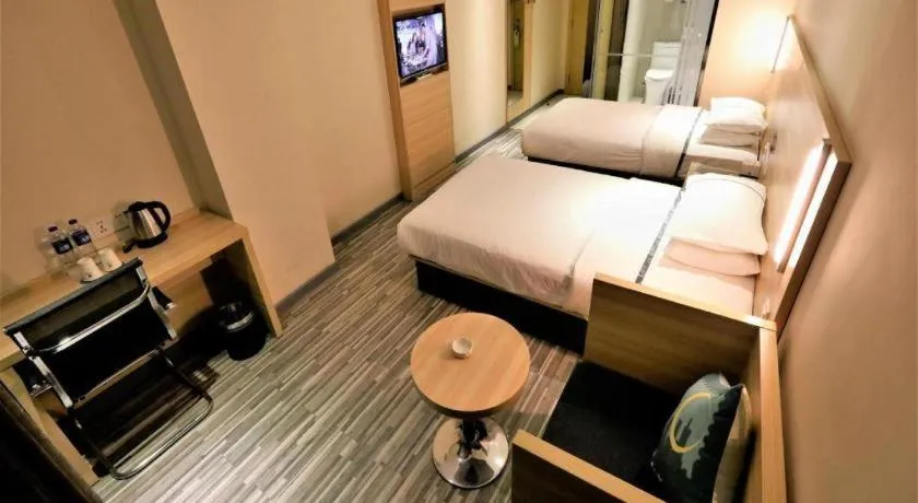 Bed in City Comfort Inn Yichang Gezhouba CBD Shopping Center