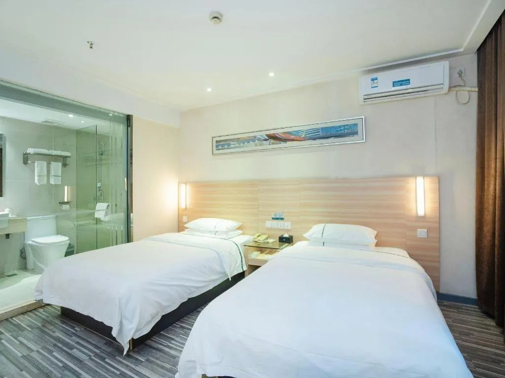 Bed in City Comfort Inn Yichang Gezhouba CBD Shopping Center