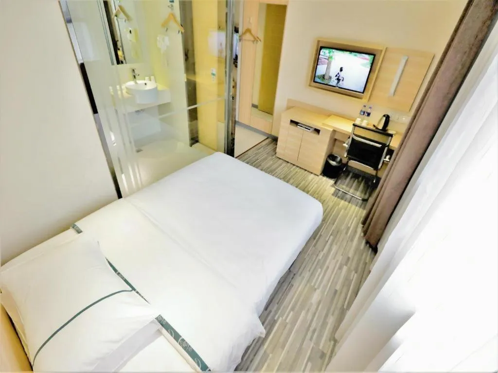 Bed in City Comfort Inn Yichang Gezhouba CBD Shopping Center