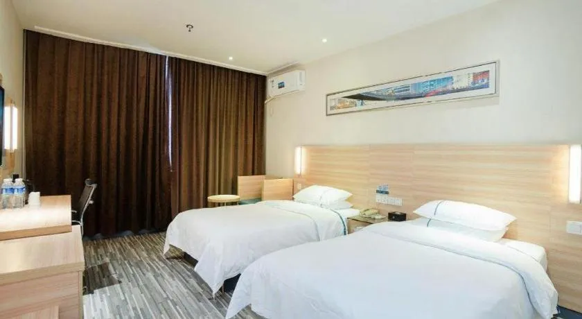 Bed in City Comfort Inn Yichang Gezhouba CBD Shopping Center