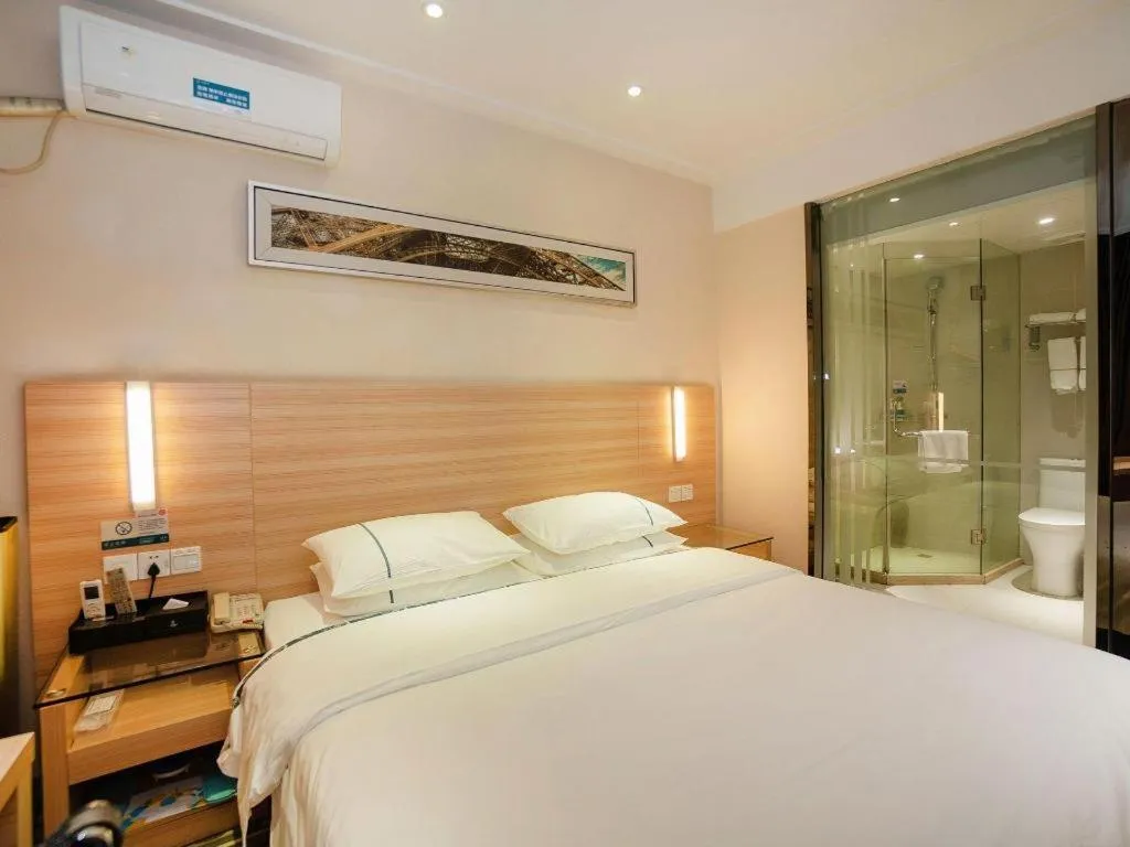 Bed in City Comfort Inn Yichang Gezhouba CBD Shopping Center