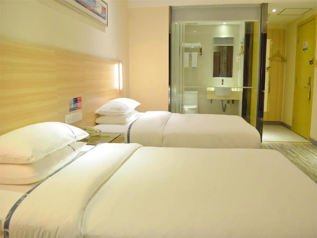 Bed in City Comfort Inn Yichang Gezhouba CBD Shopping Center