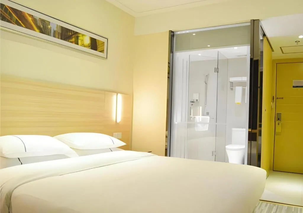 Bed in City Comfort Inn Yichang Gezhouba CBD Shopping Center
