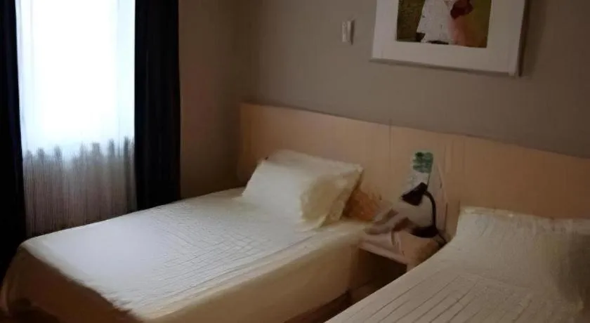 Bed in Jinjiang Inn Tianjin People's Hospital