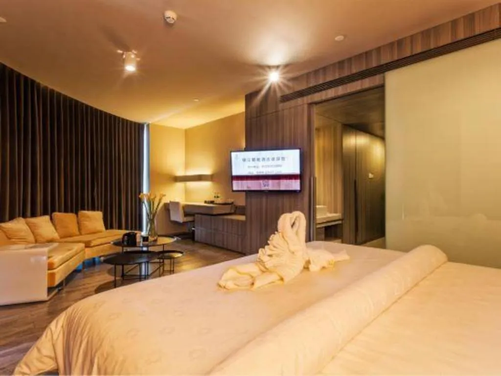 Bed in Jinjiang Metropolo Hotel - Qingdao Chengyang District Government