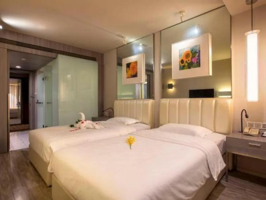 Bed in Jinjiang Metropolo Hotel - Qingdao Chengyang District Government