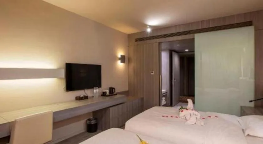 Bed in Jinjiang Metropolo Hotel - Qingdao Chengyang District Government