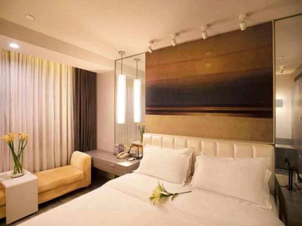 Bed in Jinjiang Metropolo Hotel - Qingdao Chengyang District Government