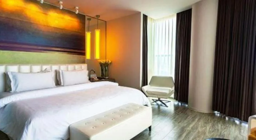 Bed in Jinjiang Metropolo Hotel - Qingdao Chengyang District Government