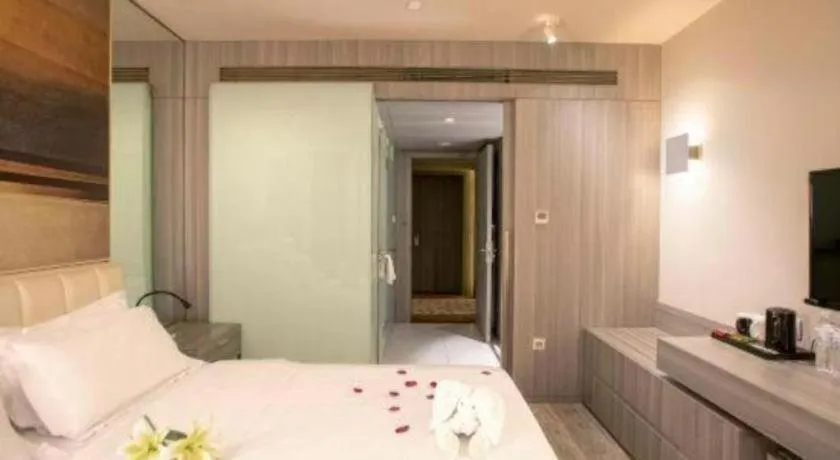 Bed in Jinjiang Metropolo Hotel - Qingdao Chengyang District Government