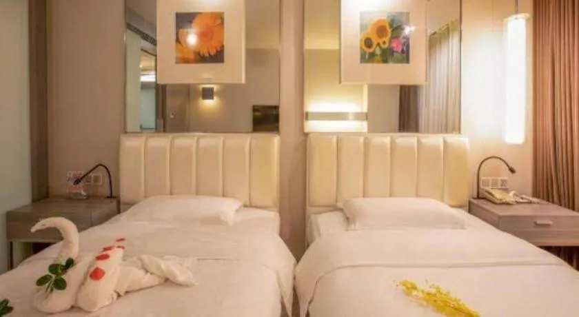 Bed in Jinjiang Metropolo Hotel - Qingdao Chengyang District Government