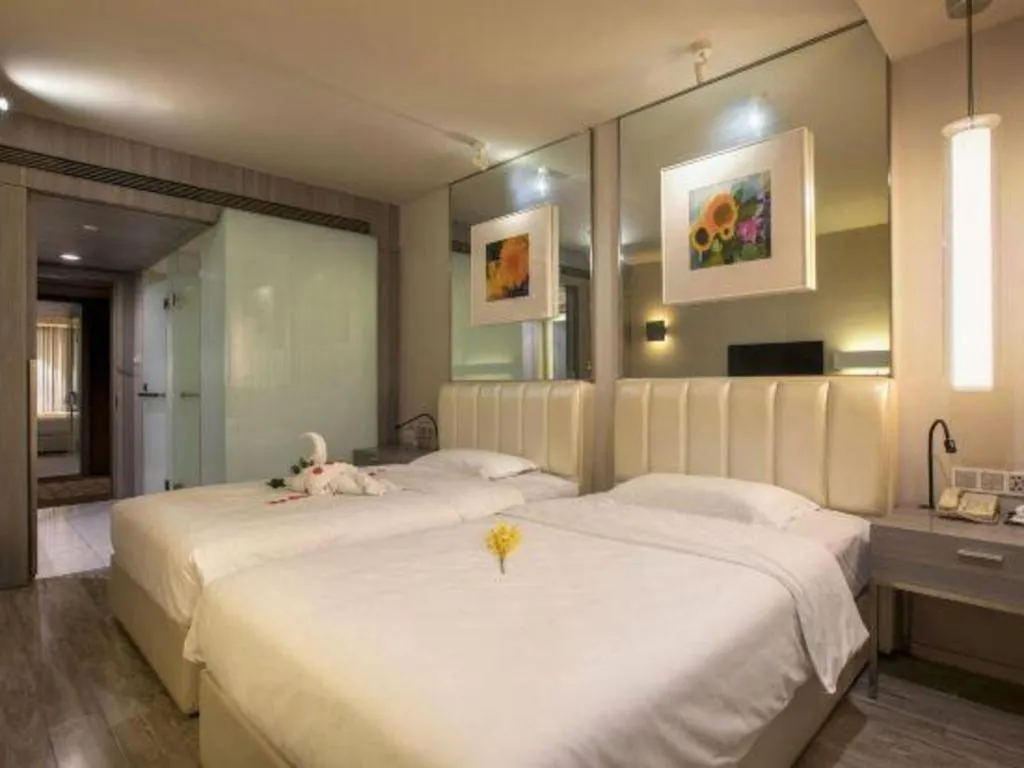 Bed in Jinjiang Metropolo Hotel - Qingdao Chengyang District Government