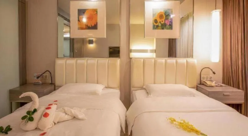 Bed in Jinjiang Metropolo Hotel - Qingdao Chengyang District Government