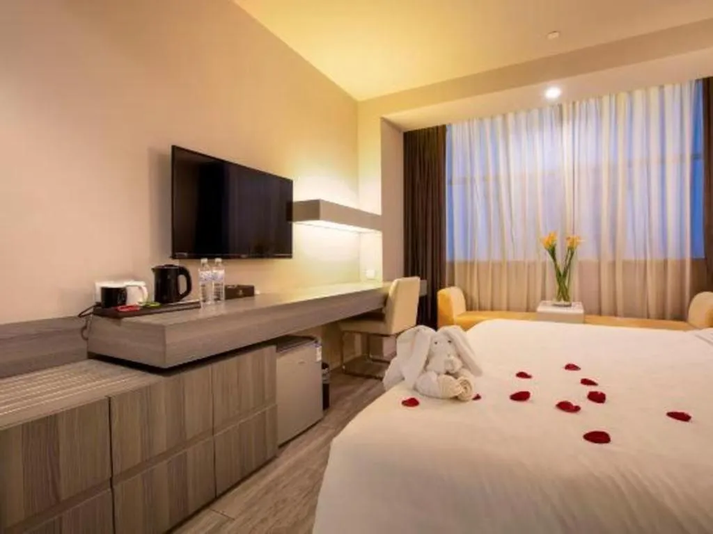 Bed in Jinjiang Metropolo Hotel - Qingdao Chengyang District Government