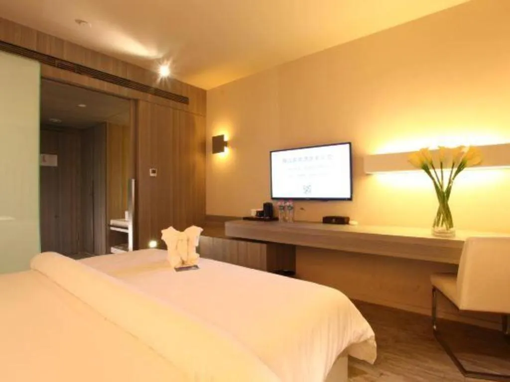 Bed in Jinjiang Metropolo Hotel - Qingdao Chengyang District Government