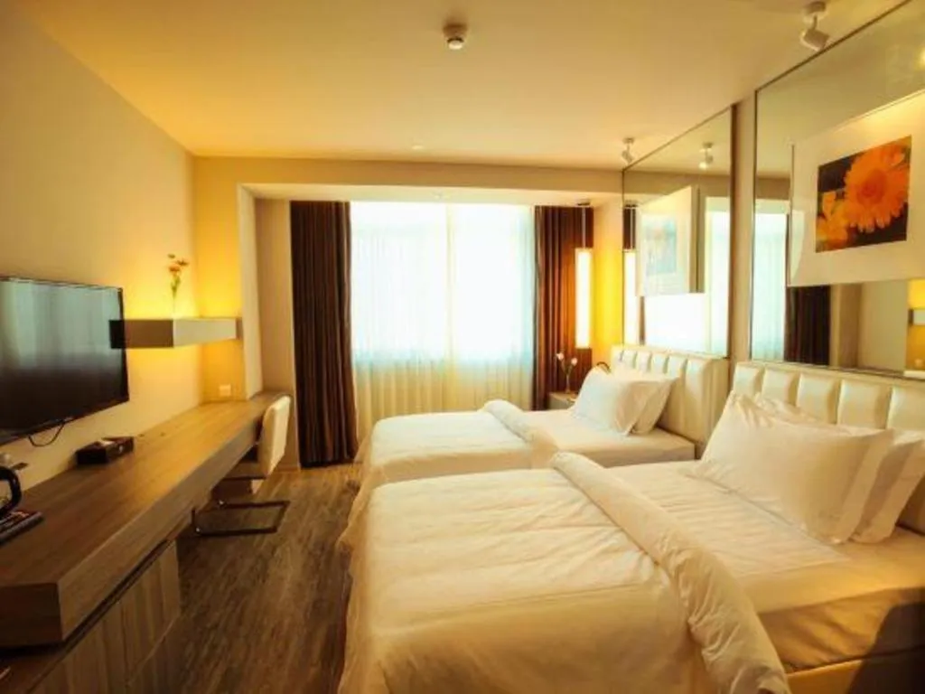 Bed in Jinjiang Metropolo Hotel - Qingdao Chengyang District Government