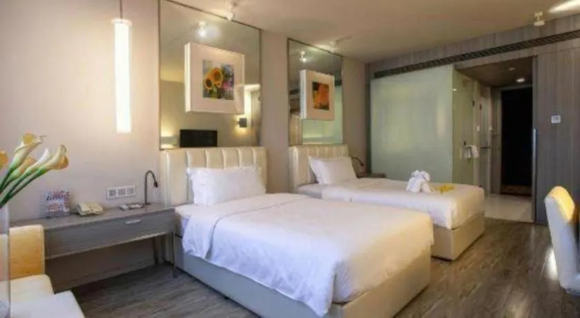 Bed in Jinjiang Metropolo Hotel - Qingdao Chengyang District Government