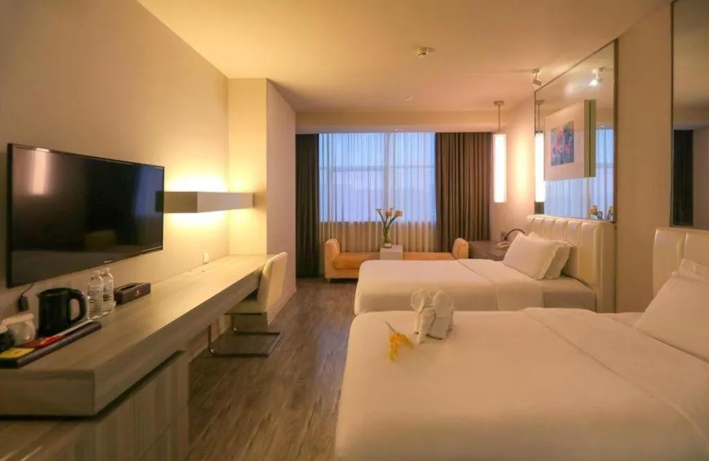 Bed in Jinjiang Metropolo Hotel - Qingdao Chengyang District Government