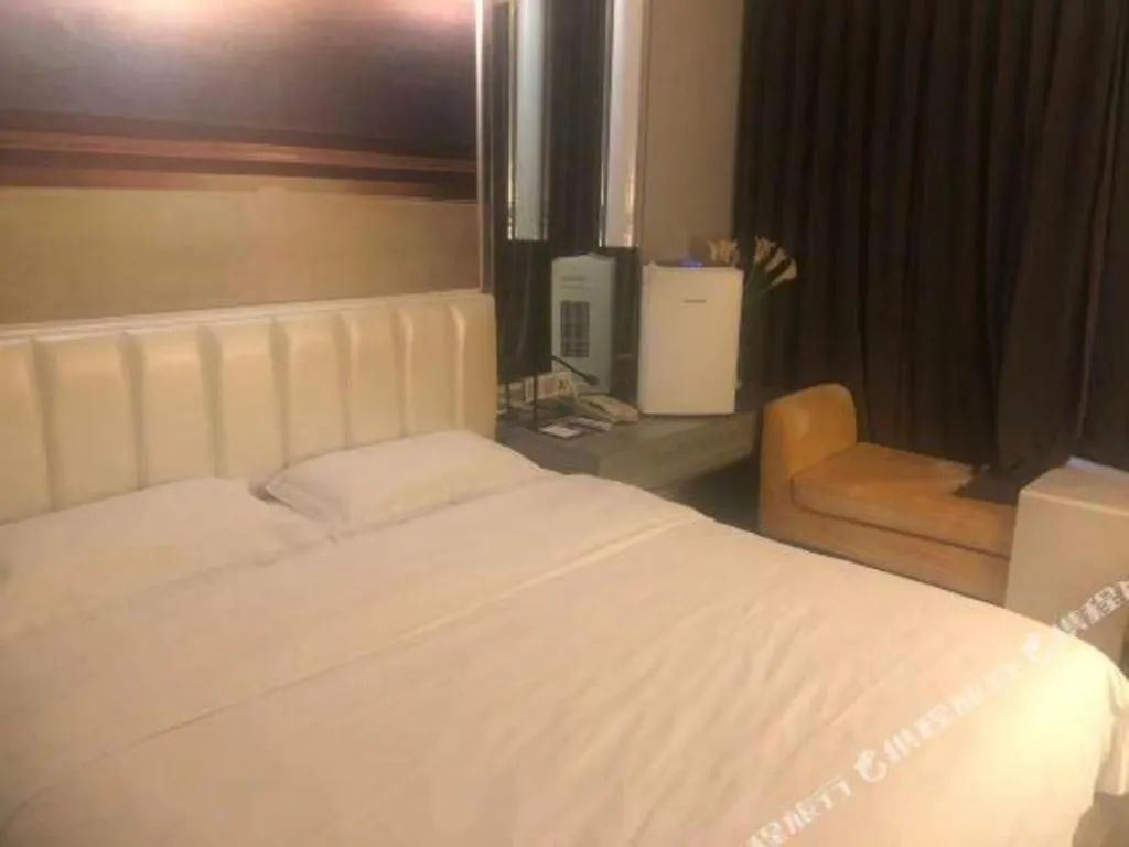 Bed in Jinjiang Metropolo Hotel - Qingdao Chengyang District Government