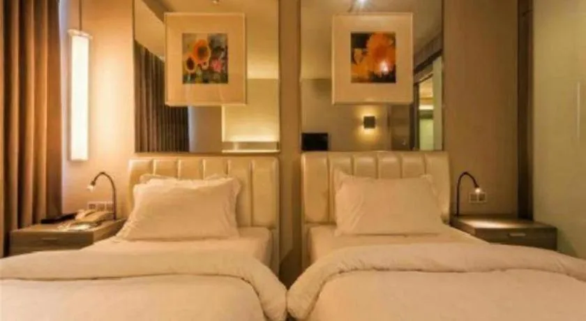 Bed in Jinjiang Metropolo Hotel - Qingdao Chengyang District Government