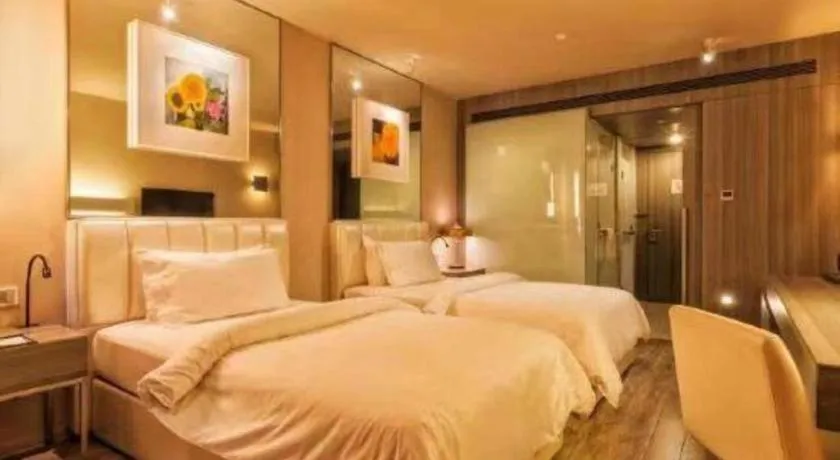 Bed in Jinjiang Metropolo Hotel - Qingdao Chengyang District Government