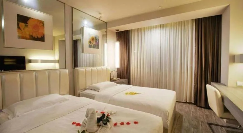 Bed in Jinjiang Metropolo Hotel - Qingdao Chengyang District Government