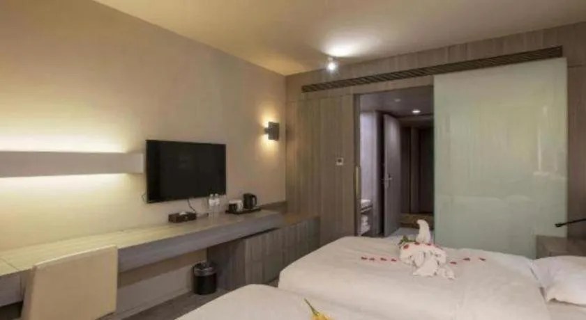 Bed in Jinjiang Metropolo Hotel - Qingdao Chengyang District Government