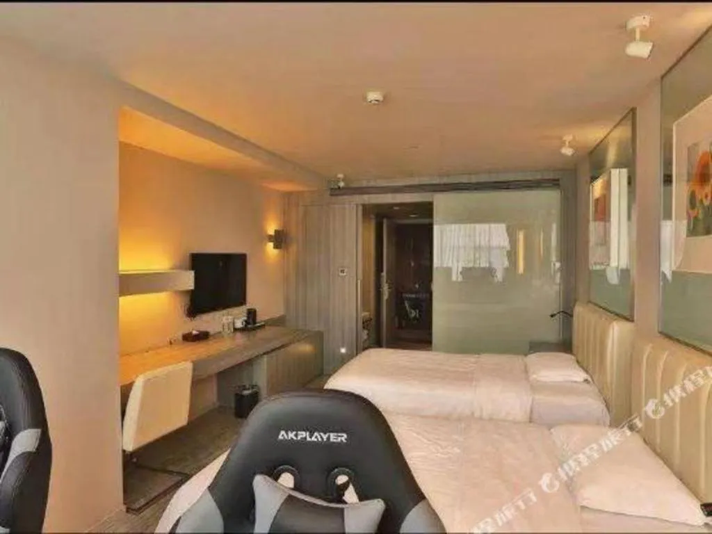 Bed in Jinjiang Metropolo Hotel - Qingdao Chengyang District Government