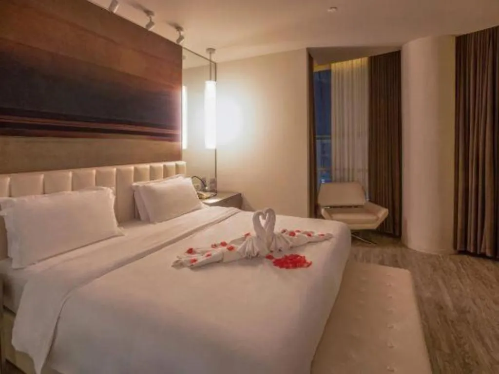 Bed in Jinjiang Metropolo Hotel - Qingdao Chengyang District Government